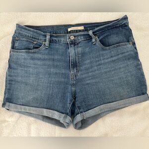 Levi's denim shorts size 33. Mid length short.